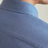 Den stickade skjortan för både kontoret och middagen Den stickade skjortan för både kontoret och middagen