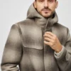 Dufflecoaten i ull och alpacka Dufflecoaten i ull och alpacka