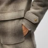 Dufflecoaten i ull och alpacka Dufflecoaten i ull och alpacka