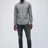 Fleckad chambray-skjorta Fleckad chambray-skjorta