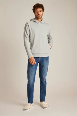 Huvtröja i stretchig frotté med tryckknappar Huvtröja i stretchig frotté med tryckknappar