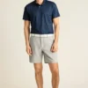 Performance Golf Shirt: enfärgad och randig