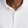 Performance Golf Shirt: enfärgad och randig