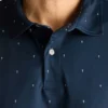 Performance Golf Shirt: enfärgad och randig