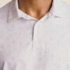 Performance Golf Shirt: enfärgad och randig