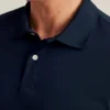 Performance Golf Shirt: enfärgad och randig