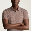 Performance Golf Shirt: enfärgad och randig