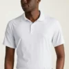 Performance Golf Shirt: enfärgad och randig