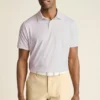Performance Golf Shirt: enfärgad och randig