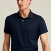 Performance Golf Shirt: enfärgad och randig
