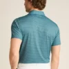 Performance Golf Shirt: enfärgad och randig