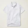Performance Golf Shirt: enfärgad och randig