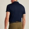Performance Golf Shirt: enfärgad och randig