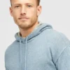 Poncho-tröja med huva i bomull